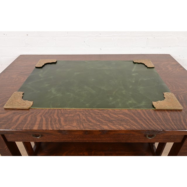 A gorgeous set of four Art Deco or Arts & Crafts period "Viking" collection bronze blotter corners, with a custom green...