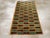 This mid-20th century Turkish Anatolian deco rug, measuring 3' 0" x 5' 2", features a bold and minimalist composition with...