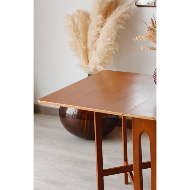 Bendt winge drop-leaf scandinavian table – teak and beech – 1950s/60s elegant and ingenious, this scandinavian drop-leaf...