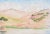 Vibrant California landscape consisting of pink and gold rolling hills, oak trees, and a body of water in the foreground....