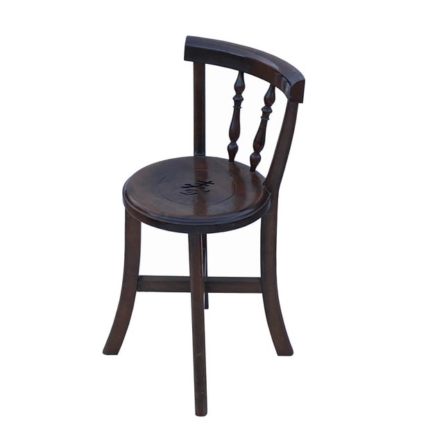 This is an oriental side chair with a brown color finish and a Chinese "Shou" =Longevity character carved on the seat. It...
