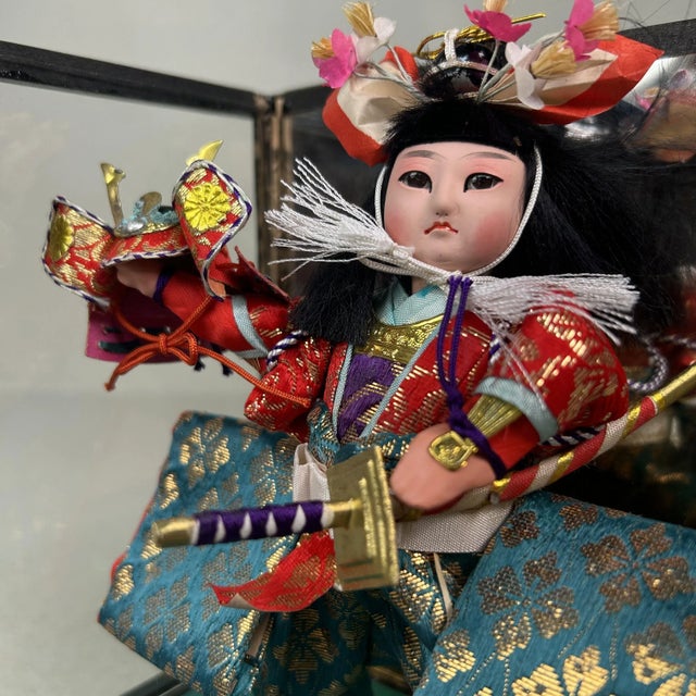 Authentic Satsuki doll in a wooden display case with glass panels, featuring a removable front. Dimensions: height 22.5...