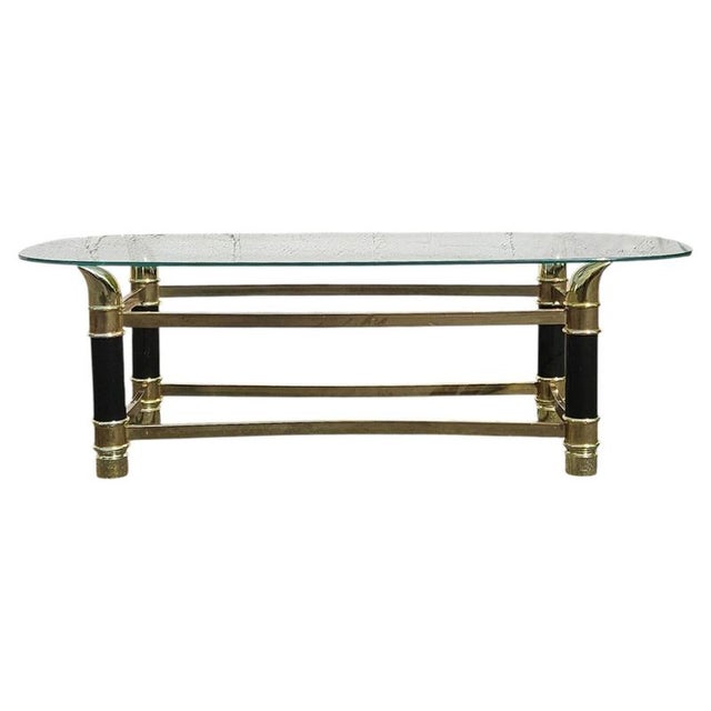 Glass coffee table with tusk-shaped legs – Tommaso Barbi - Lounge table from the 1980s. This Tommaso Barbi-inspired tusk-...