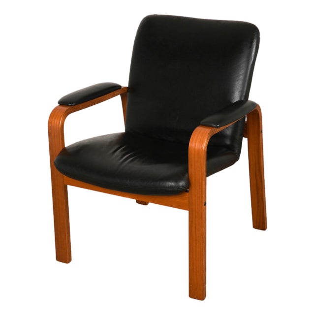 Ekornes 1970s Teak Black Leather Scandinavian Lounge Chair For Sale