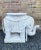 White lacquered woven wicker elephant which can be used for several purposes for instance a garden stool, side table,...