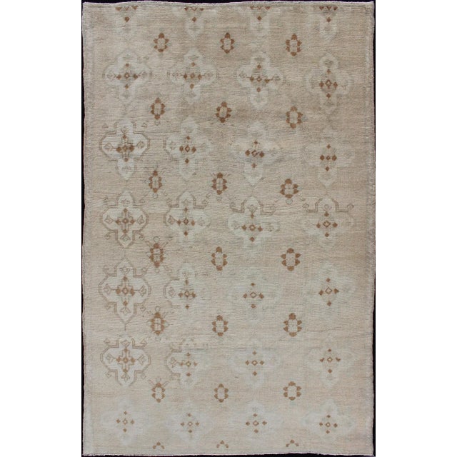 Muted Oushak Hand Knotted With All-Over Tribal Design in Light Tones of Taupe and Browns For Sale - Image 12 of 12