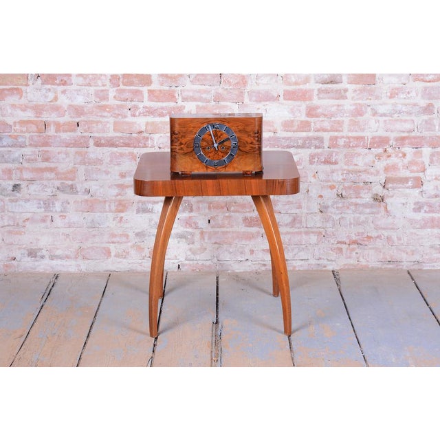 This luxurious table clock is a masterpiece of the peak Art Deco period, dating back to 1920s Czechoslovakia. It...