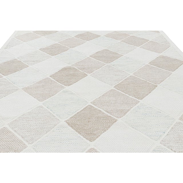 Handwoven in a wool flatweave, this 10x14 custom rug design is an exciting new addition to Rug & Kilim’s Scandinavian rug...