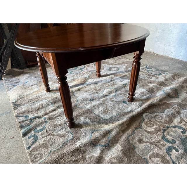 Antique Walnut 19th century dining table with turned legs Solid wood frame, a little crack on top as pictures. Sturdy and...