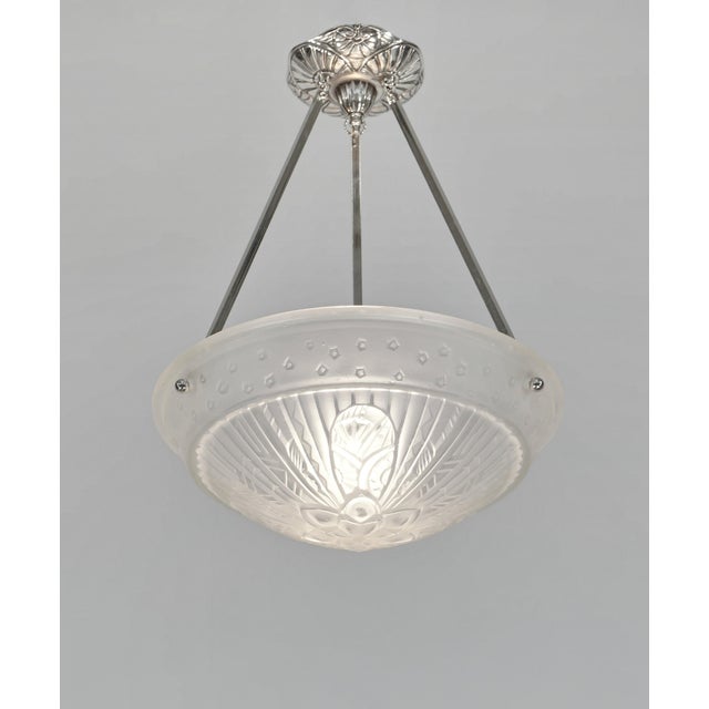 Jamain & Frontisi A signed French art deco hanging fixture around 1930 in nickel plated bronze or solid brass. The pendant...