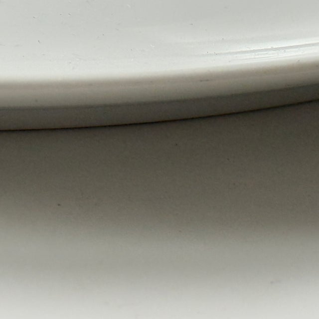 Item: Cake stand, approx. 32 cm Manufacturer: Rosenthal Series: Asimmetria Decoration: Gold flower Material: Porcelain...