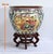Large enameled polychrome china porcelain aquarium. It is decorated with traditional Chinese cartridge scenes on the...