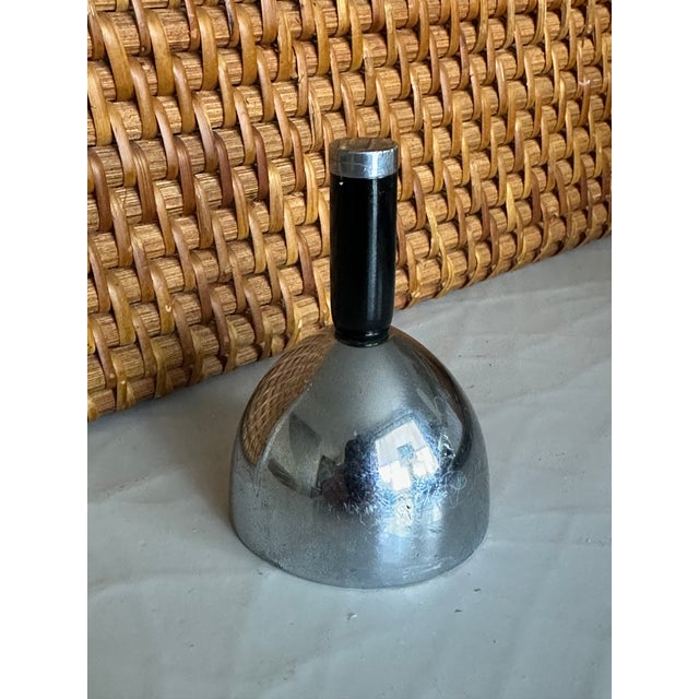 A striking Art Deco chrome dinner bell produced by the renowned Chase Brass & Copper Company, celebrated for its modernist...