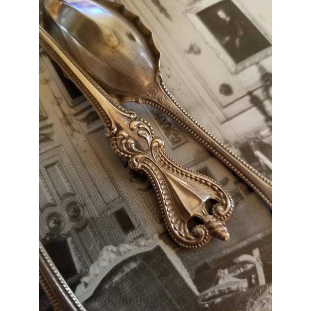 Sterling silver antique fruit or ice cream spoons by "old colonial " by Towle.