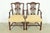 A gorgeous pair of Georgian or Chippendale style armchairs or dining captain chairs In the manner of Baker Furniture USA,...