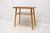 This Mid-Century side table was made in the former Czechoslovakia in the 1970s. It was produced by Drevopodnik Holešov...