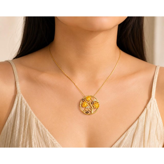 14K Yellow Gold Diamond Topaz Smokey Quartz Leaf Pendant. This elegant pendant features four hand-carved natural topaz...