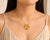 14K Yellow Gold Diamond Topaz Smokey Quartz Leaf Pendant. This elegant pendant features four hand-carved natural topaz...