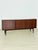 For sale is this elegant mid-century sideboard made of fine solid wood, stylishly combining timeless elegance and superb...
