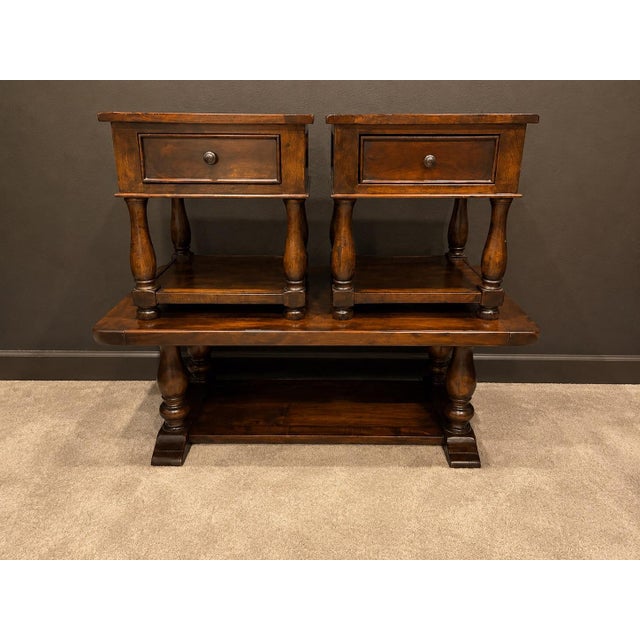 Solid wood 3-piece living room set. Includes coffee table and two matching end tables with drawers and lower shelves. Very...