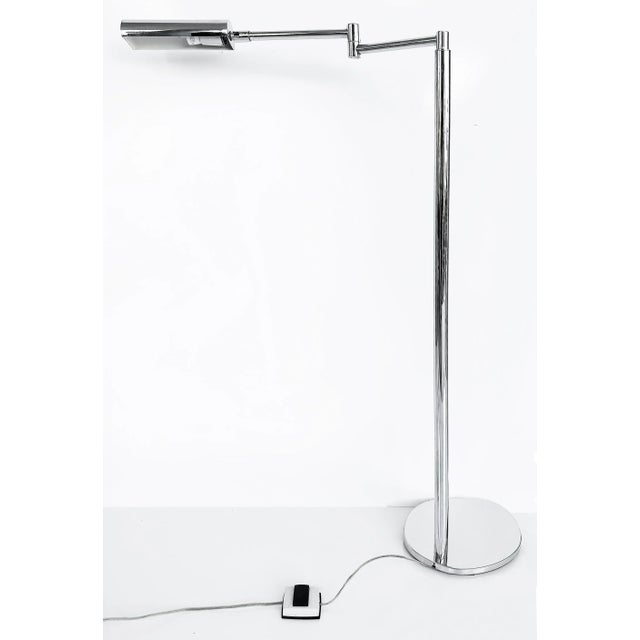 Koch & Lowy Adjustable Swing Arm Chrome Floor Lamp OMI, 1960s Offered for sale is a chrome swing arm adjustable floor lamp...