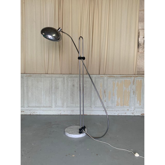 Impressive, large floor lamp with an extendable chrome arc on a marble base (with a small chip on the base). The arc is...