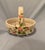 Beautiful handmade/handpainted polished ceramic basket of pink flowers/green leaves on white background For display or use...
