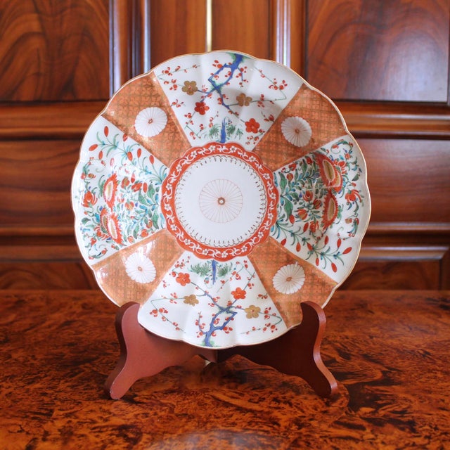 In orange and gold, a rare delicately painted Japanese inspired pattern, this dish features a fresh palette of burnt...