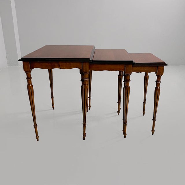 Italian mid-century modern wooden nesting coffee tables, 1940s Set of three coffee tables, all made entirely of wood. The...