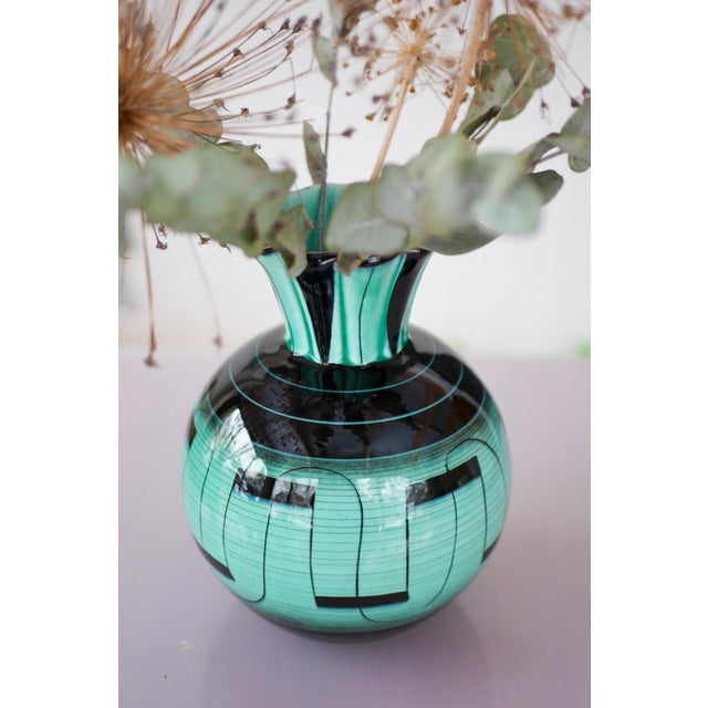 A striking Art Deco ceramic vase designed in the 1930s by Ilse Claesson for the prestigious Swedish manufacturer...