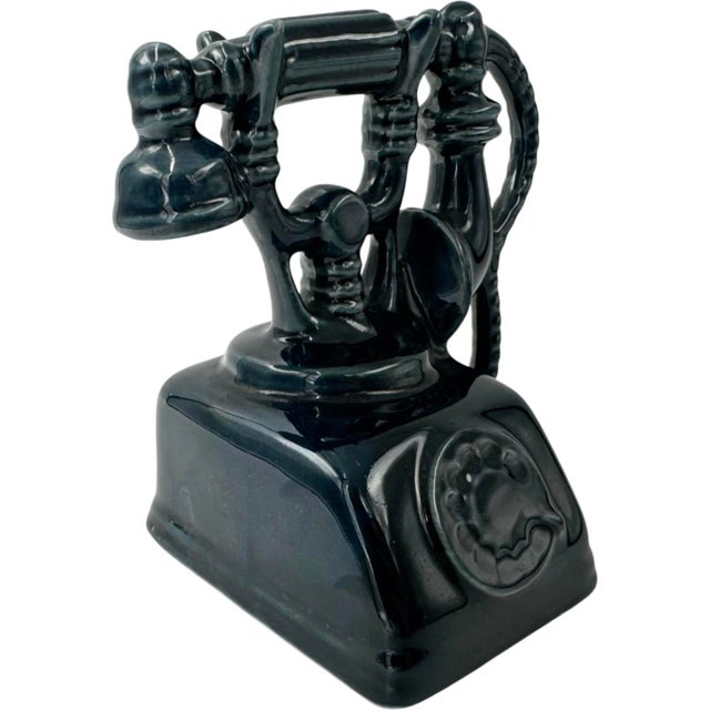Details: -A charming vintage ceramic ashtray in the form of a rotary telephone -Deep blue glazed finish -Reverse features...