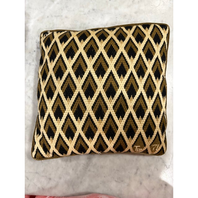 Celebrate the artistry of vintage needlework with this stunning handmade Bargello pillow, signed by the late textile...