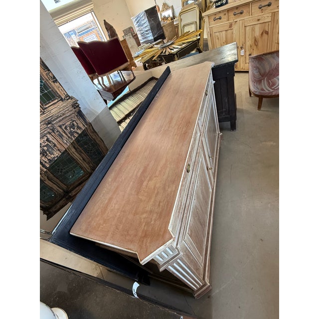 19th century French Louis XVI sideboard made of solid mahogany; The wood has been finished with a French patina paint and...