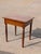This Early 19th Century Antique Sheraton Style Side Table is a superb example of Federal-era craftsmanship, blending...
