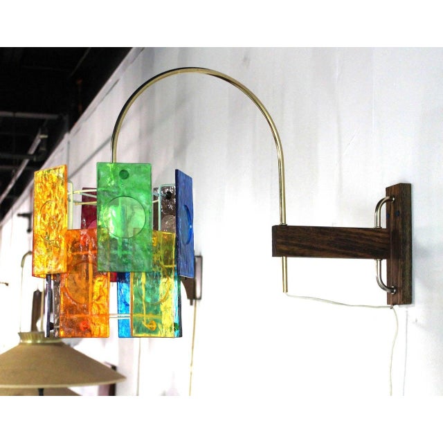Adjustable positioning mid century modern light fixture sconce. Blue Orange Green Yellow Pink.