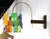 Adjustable positioning mid century modern light fixture sconce. Blue Orange Green Yellow Pink.