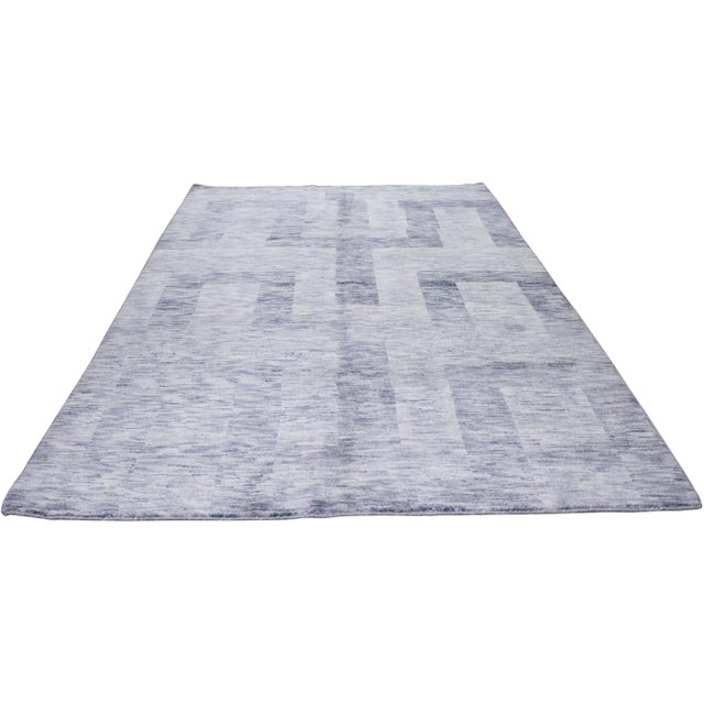 Moroccan Beni Ourain hand knotted rug with natural colors, contemporary style and soft texture.