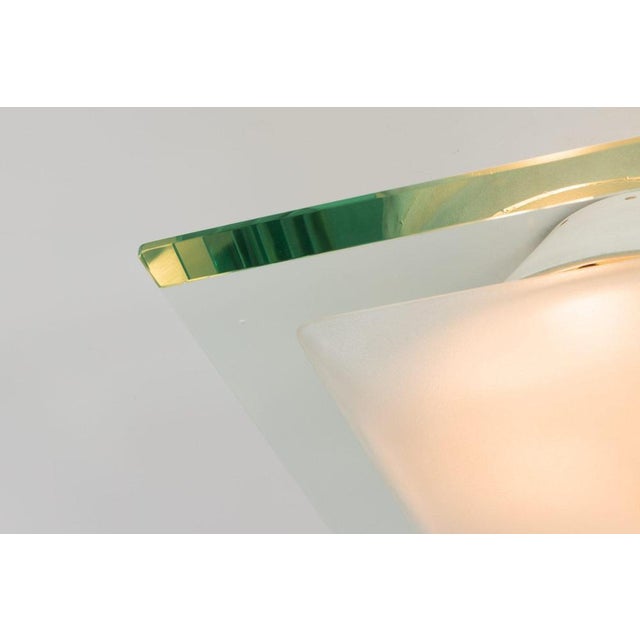 A rare and highly collectible example of Italian mid-century lighting, this model 1990 flush mount ceiling lamp was...