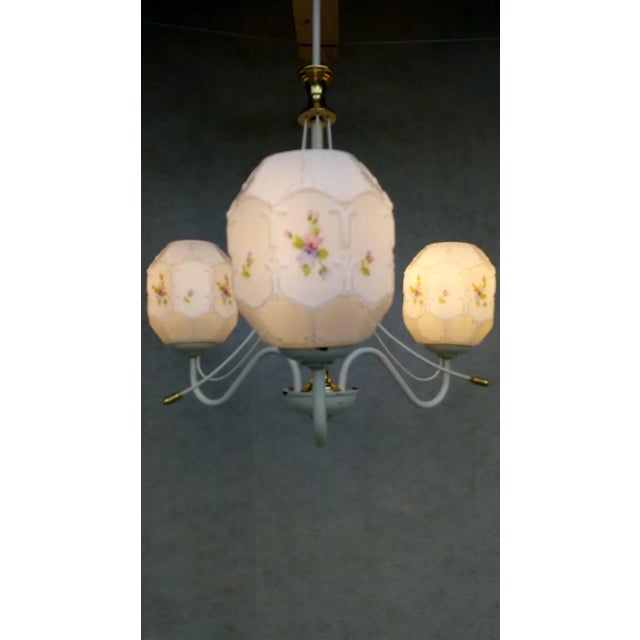 Nice Retro Vintage Chandelier from the Times of Socialism. It has a white holder with gold accessories. 3 light elements...