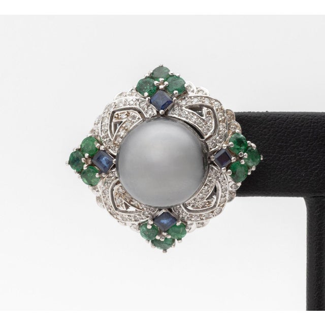 18K White Gold Tahitian Pearl Sapphire Emerald Diamond Earrings, designed as stud earrings featuring two cultured Tahitian...