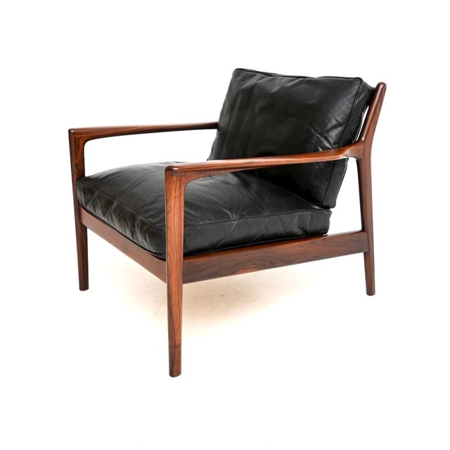 An iconic, stylish and extremely well made Swedish vintage leather U.S.A armchair by Folke Ohlsson for Dux, dating from...