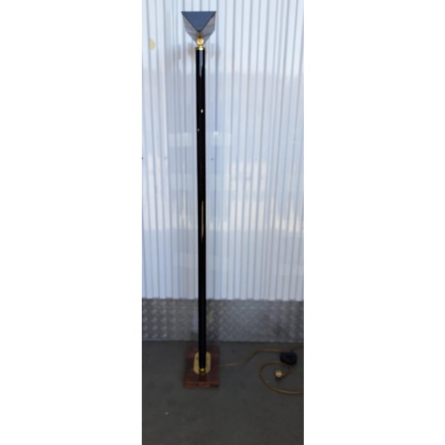 This vintage floor lamp by Relco Milano captures the refined elegance of 1970s Italian design. Featuring a sleek burlwood...