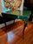 One of a Kind French Card Table with a square green painted top in the form of a fabric covering with gilt edges resting...