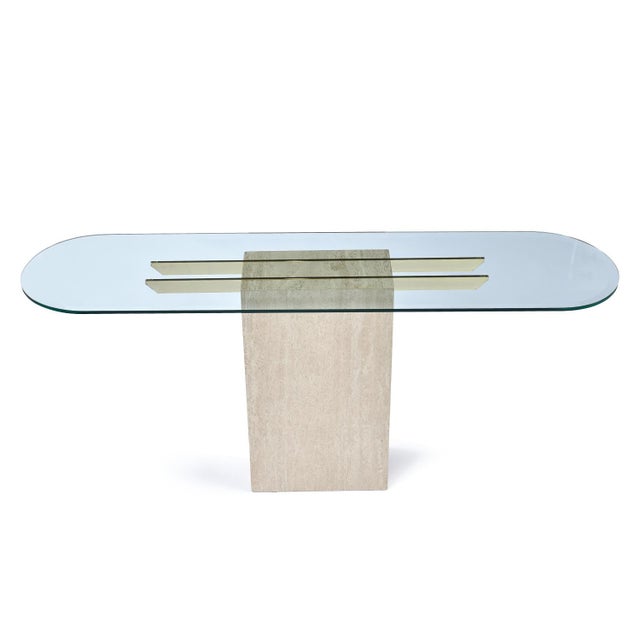 Stunning travertine stone square pedestal cocktail table in the style of Maitland-Smith. Super-sleek, elegant and Classic...