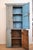 An American primitive "Stepback Cupboard". Lots of storage! Original blue paint is muted and rich with patina on the...