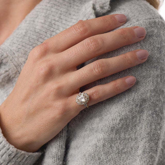 This exquisite Belle Époque French ring centers on a radiant 1.52 carat old mine cut diamond, certified by GIA...