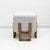 Elegant pair of sculptural stools featuring geometric ash wood frames with a warm honey-toned finish. The bases are...