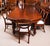 This is a beautiful dining set comprising an antique George III flame mahogany dining table, Circa 1810 in date, and a...