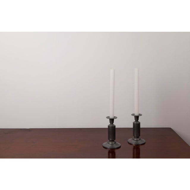 Pair of Art Deco Candlesticks by Just Andersen, Model 1424 – Denmark, 1930s This refined pair of Art Deco candlesticks,...