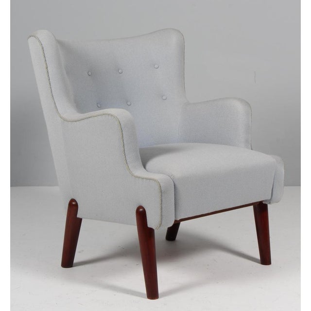 This lounge chair has the best characteristics of danish mid-century modern design. Its comfort and delicate design...
